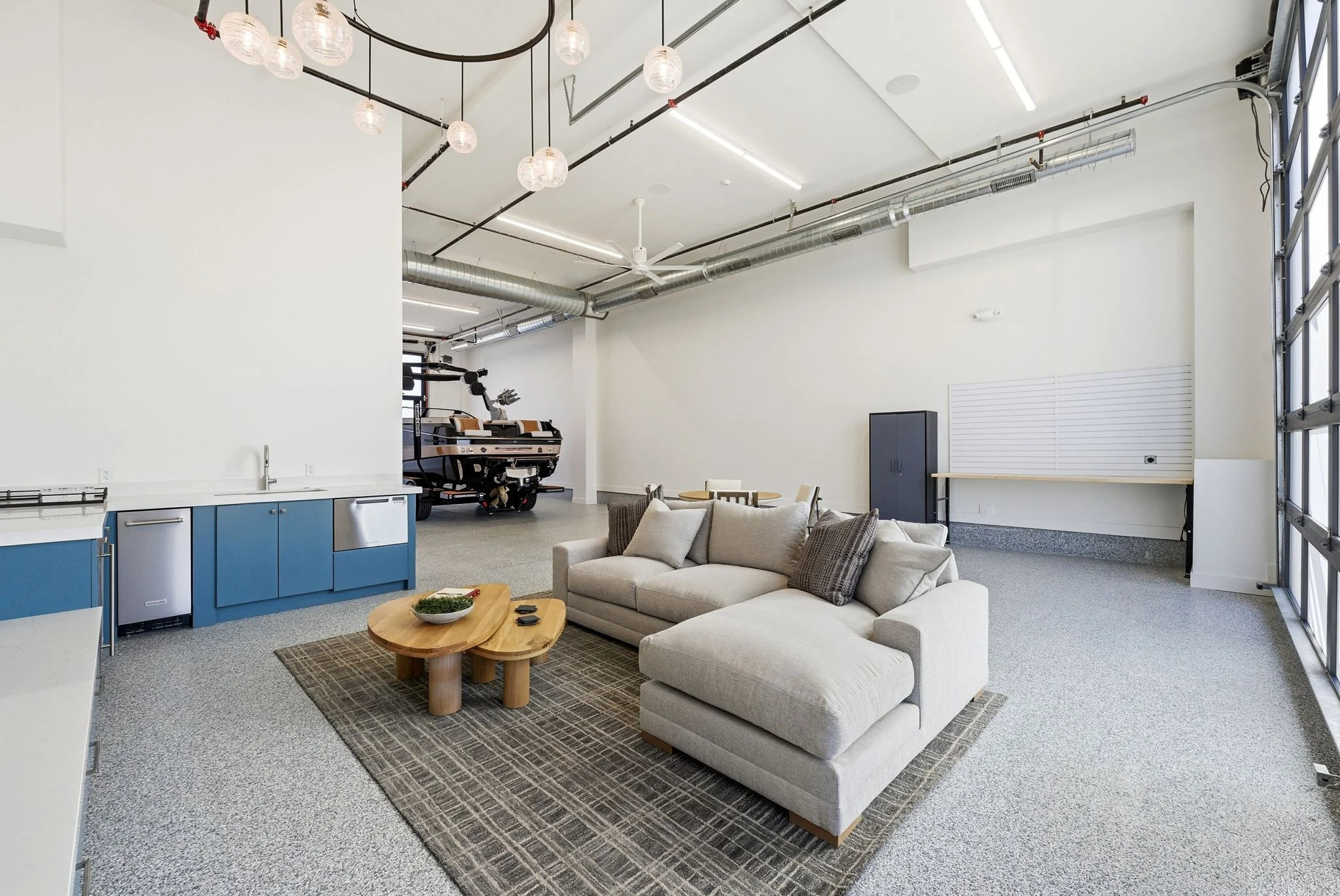 Wide angle showing garage level living space and office