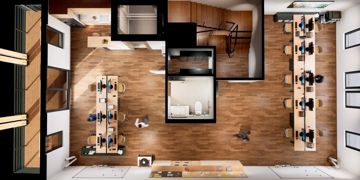 The Frontier 2-bedroom floor plan — level 2 professional office floor with two long workstation desks, conference space, half bath, and stair core at Mountain View Commons