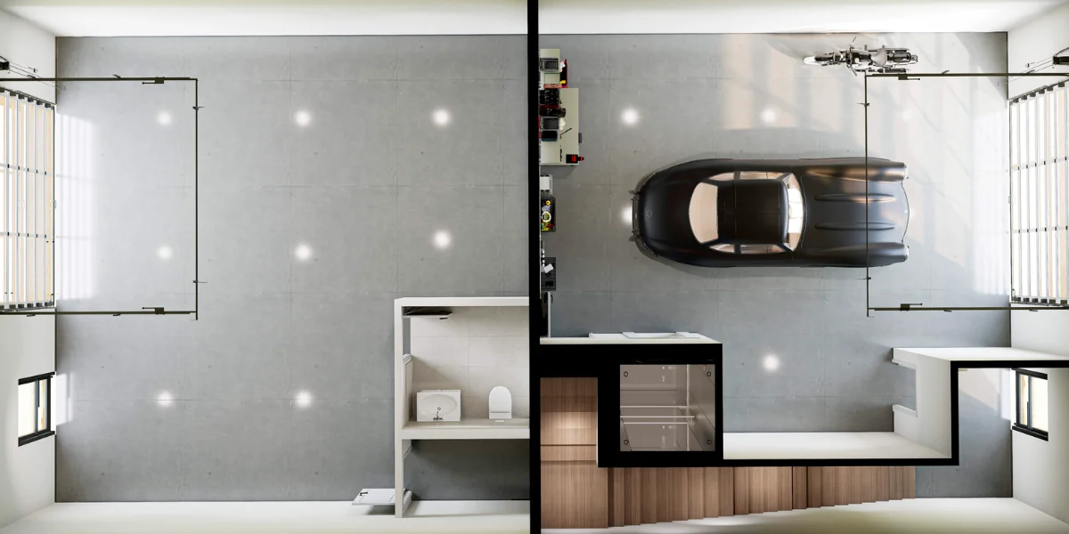 The Outlaw 3-bedroom floor plan — level 1 drive-through garage with sports car, half bath, and stair core at Mountain View Commons in Heber City Utah
